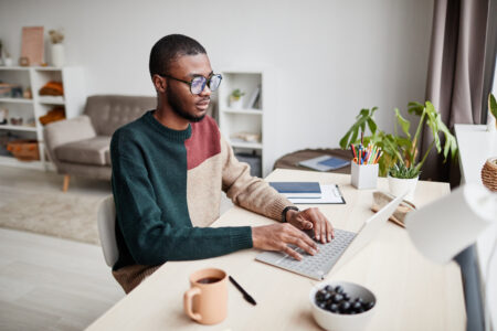 Man sitting at a computer working