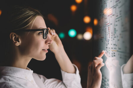 Woman working at a whiteboard