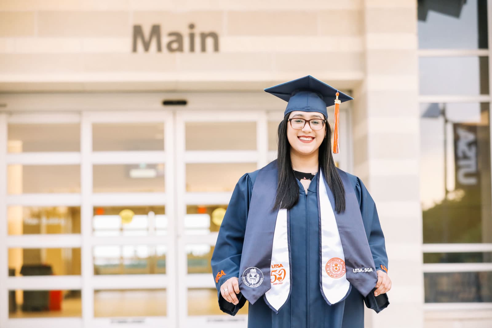 UTSA Online student graduating