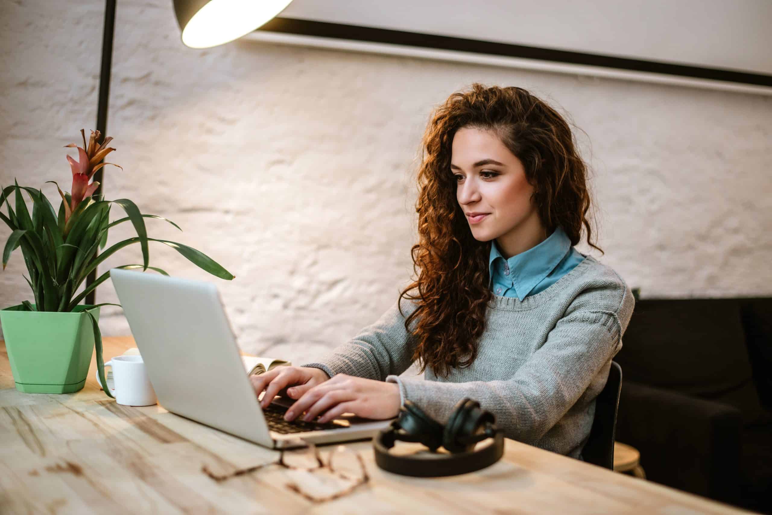 Female online student working on her laptop