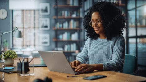 Woman on computer at table