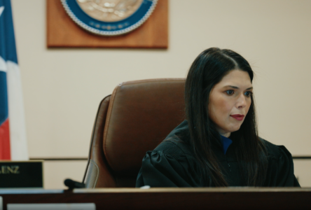 Judge Melissa Saenz sits in her courtroom.
